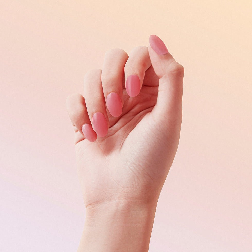 hand modeling PRESS + SET™ Gel Nail Wrap in Sugar Blush